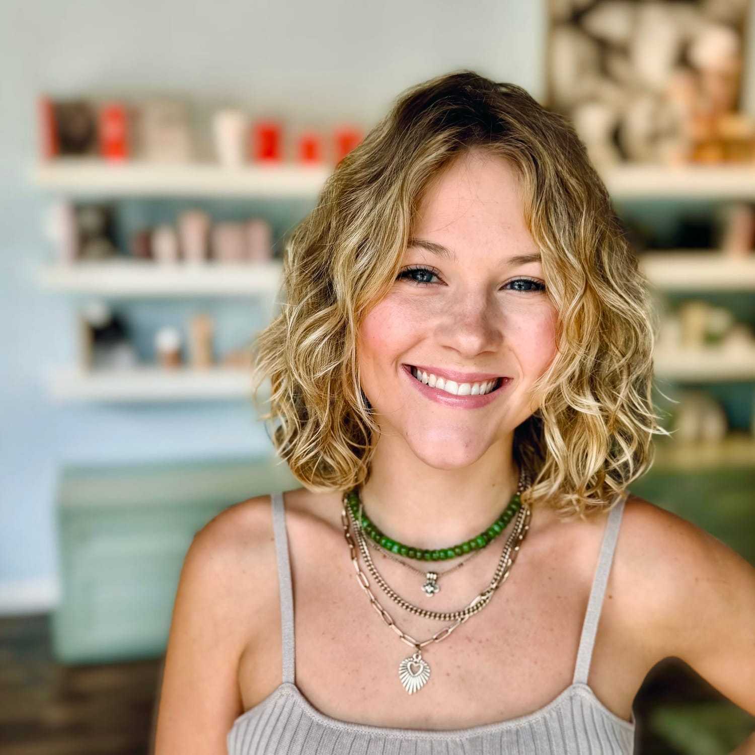 Portrait of Ramey, a professional stylist at Elixir x DV8 the salon, showcasing their expertise and style.