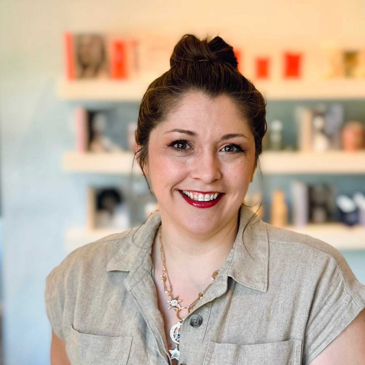 Portrait of Cayla, a professional stylist at Elixir x DV8 the salon, showcasing their expertise and style.