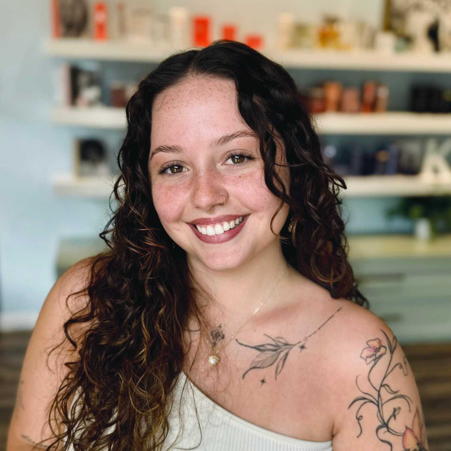 Portrait of Sydney, a professional stylist at Elixir x DV8 the salon, showcasing their expertise and style.