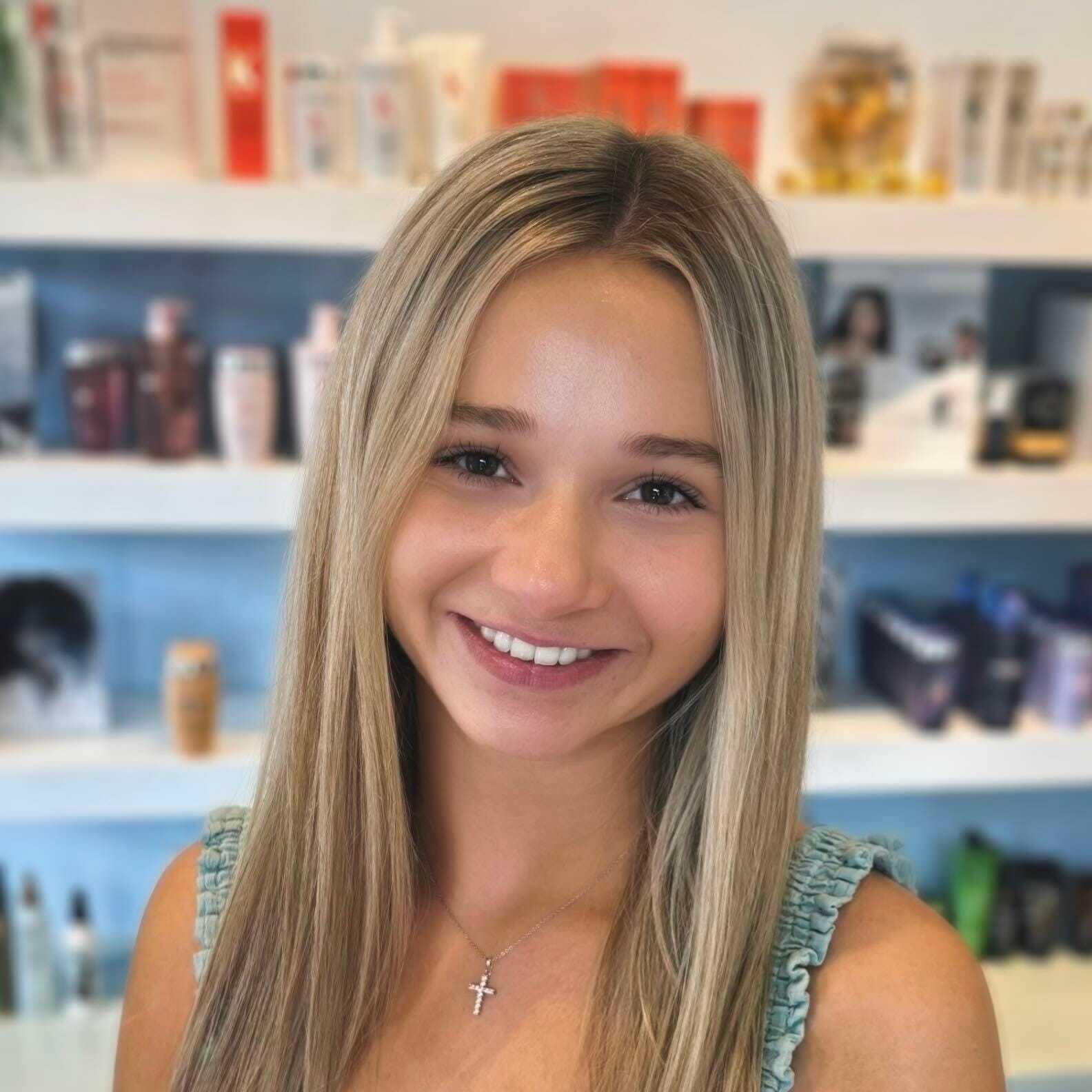 Portrait of Brooklyn, a professional stylist at Elixir x DV8 the salon, showcasing their expertise and style.