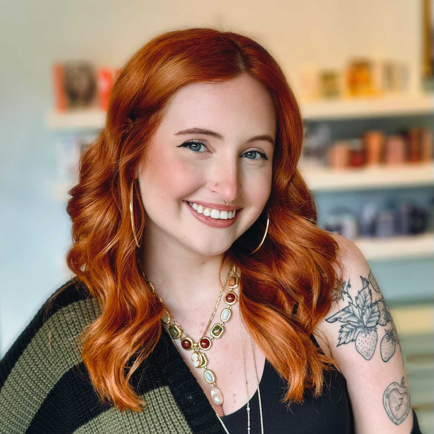 Portrait of Jo, a professional stylist at Elixir x DV8 the salon, showcasing their expertise and style.