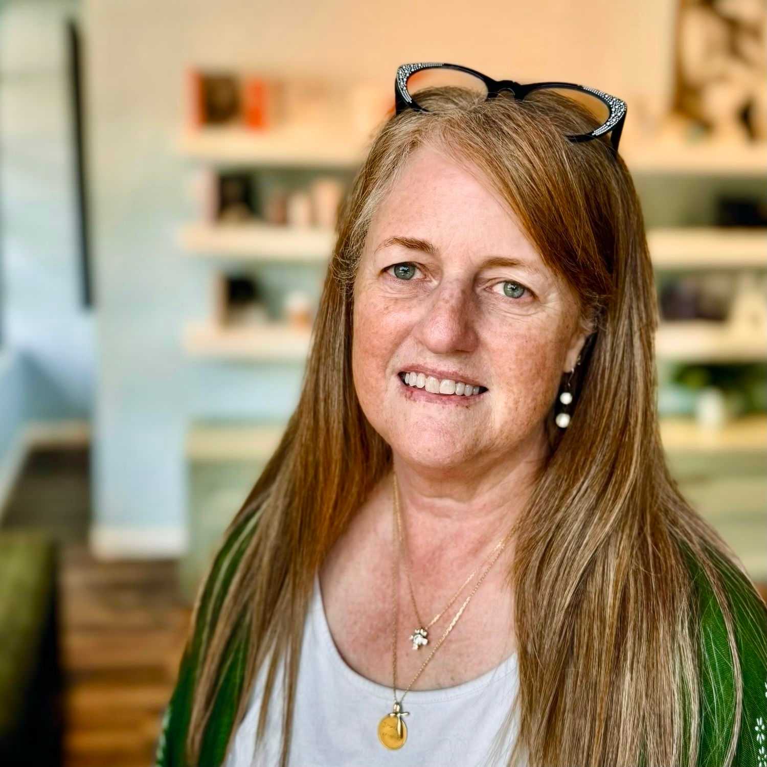 Portrait of Dawne, a professional stylist at Elixir x DV8 the salon, showcasing their expertise and style.