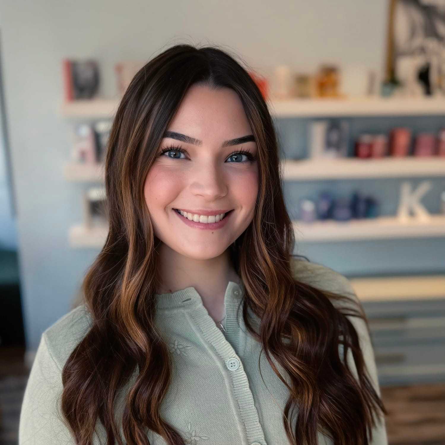 Portrait of Grace, a professional stylist at Elixir x DV8 the salon, showcasing their expertise and style.