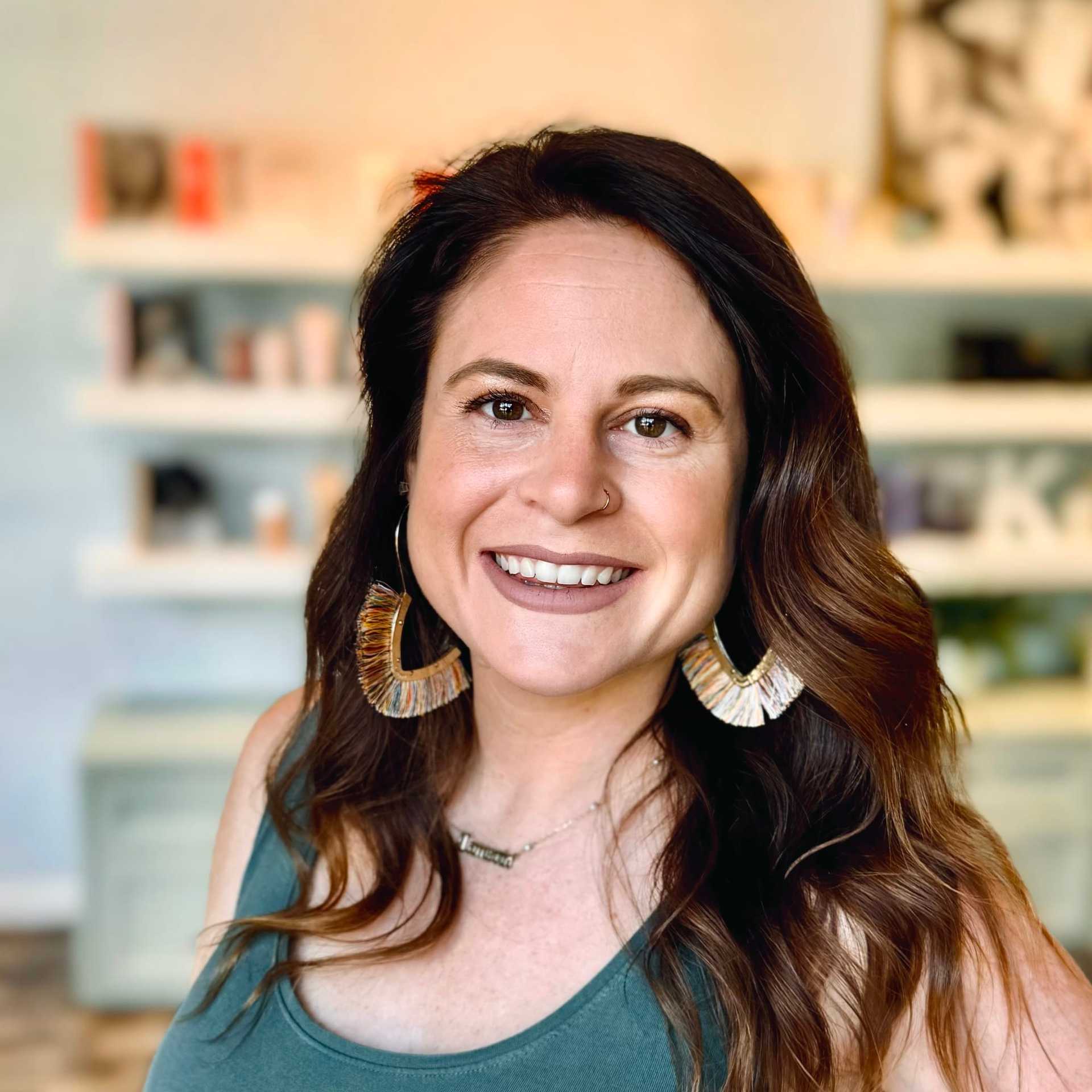 Portrait of Camerin, a professional stylist at Elixir x DV8 the salon, showcasing their expertise and style.