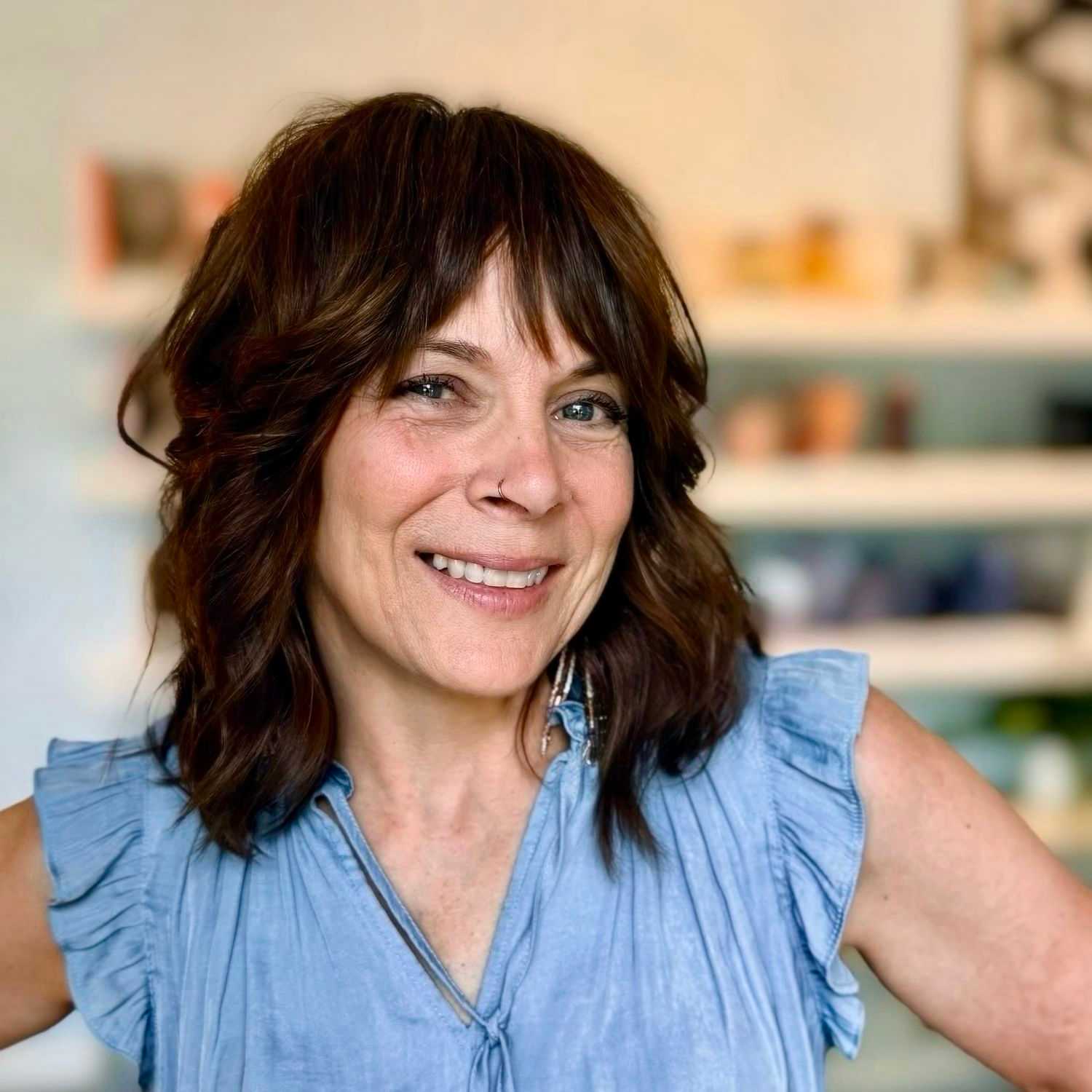 Portrait of Cyndi, a professional stylist at Elixir x DV8 the salon, showcasing their expertise and style.