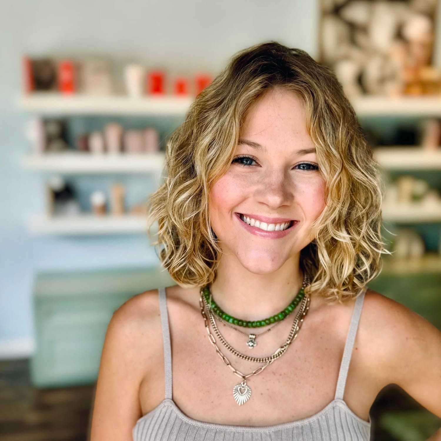 Portrait of Ramey, a professional stylist at Elixir x DV8 the salon, showcasing their expertise and style.