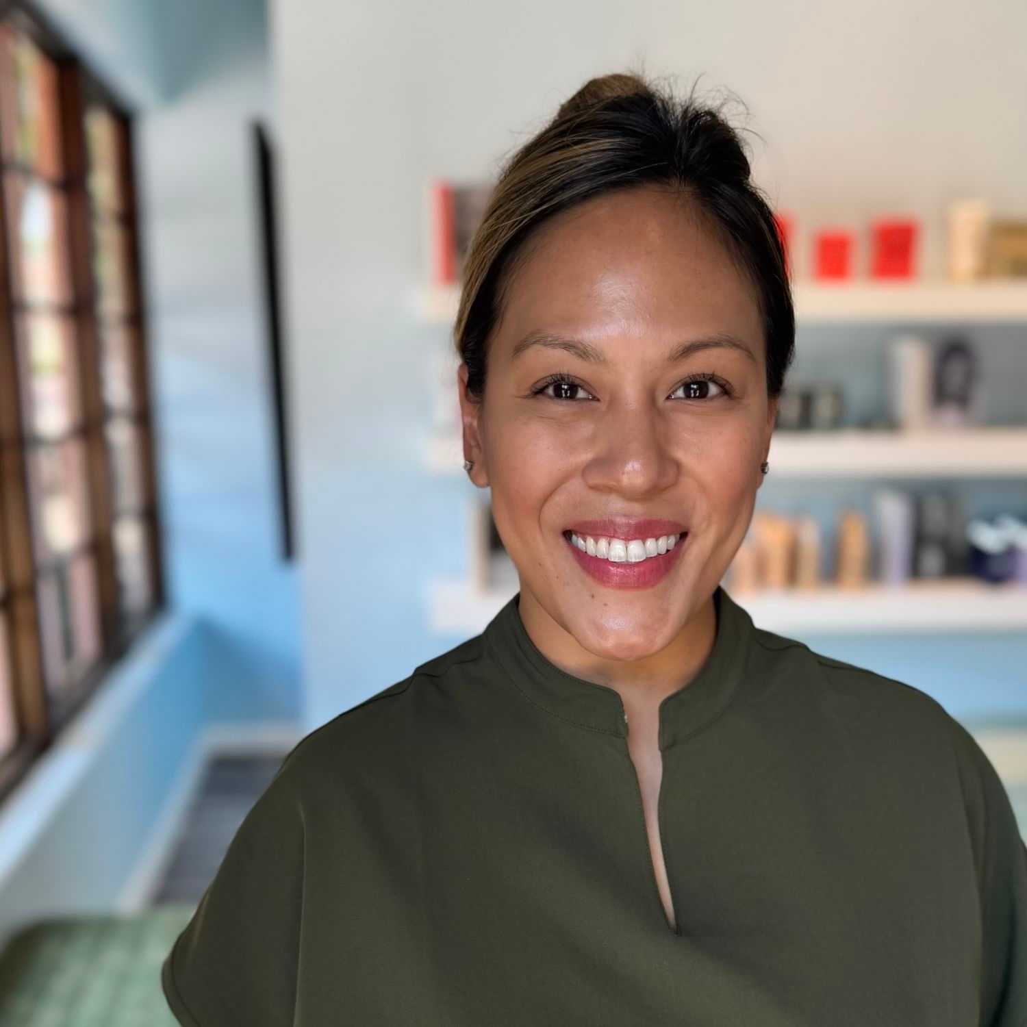 Portrait of Uyen, a professional stylist at Elixir x DV8 the salon, showcasing their expertise and style.