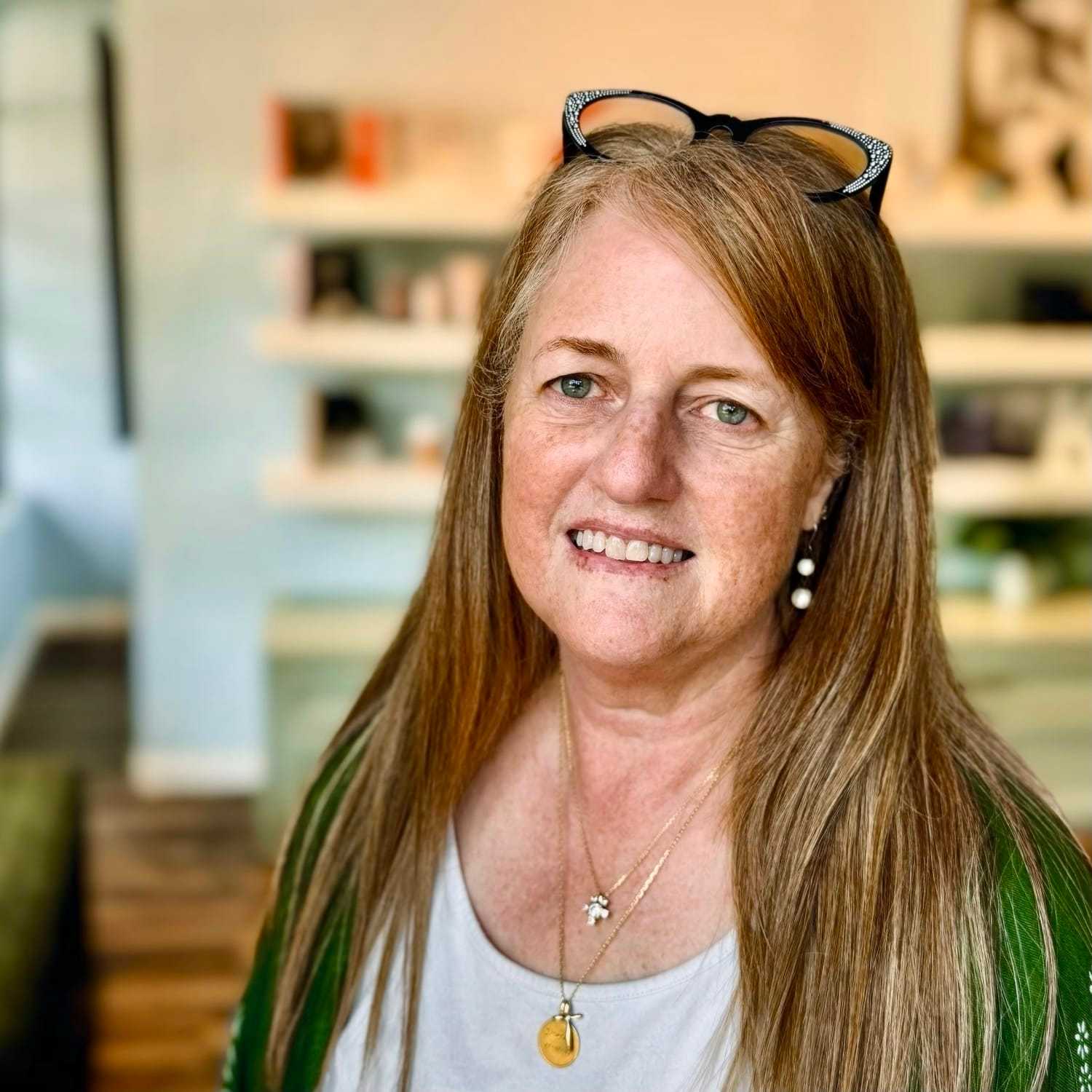 Portrait of Dawne, a professional stylist at Elixir x DV8 the salon, showcasing their expertise and style.