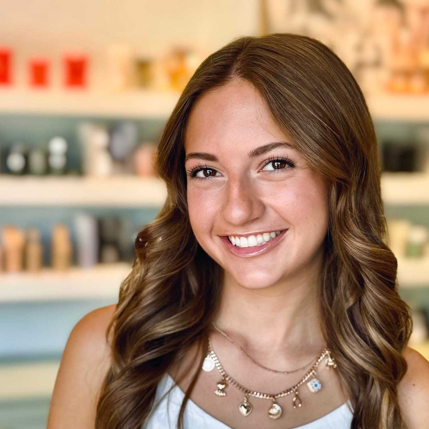 Portrait of Avery, a professional stylist at Elixir x DV8 the salon, showcasing their expertise and style.