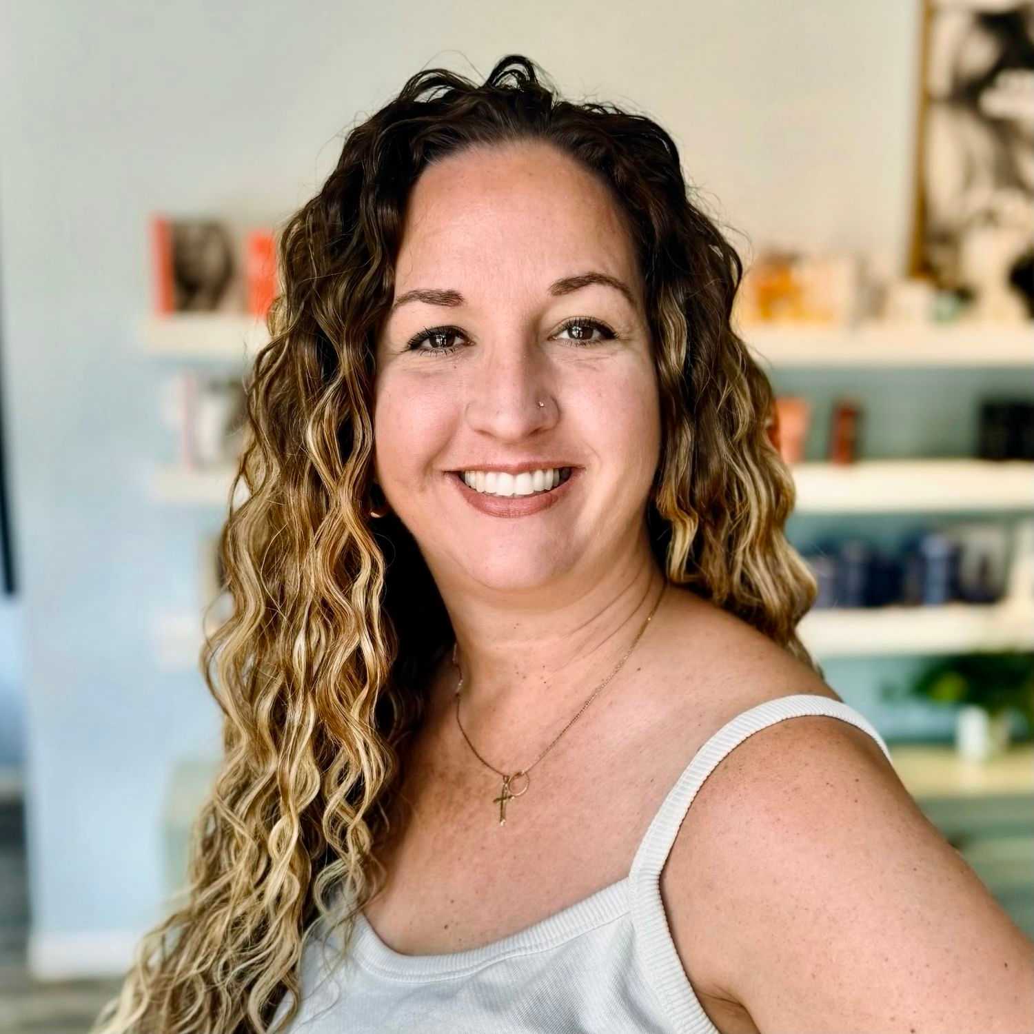 Portrait of Amy, a professional stylist at Elixir x DV8 the salon, showcasing their expertise and style.