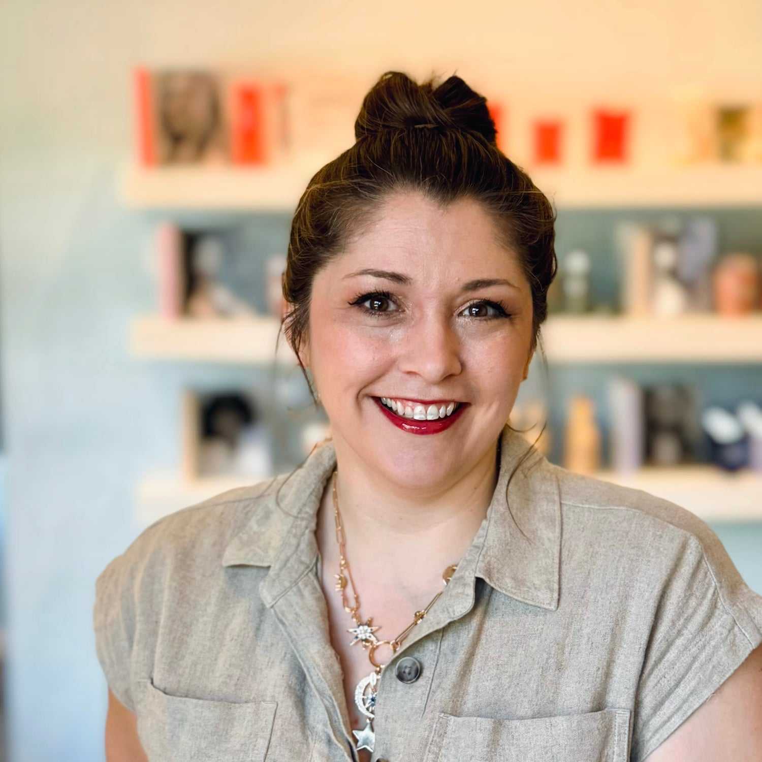 Portrait of Cayla, a professional stylist at Elixir x DV8 the salon, showcasing their expertise and style.