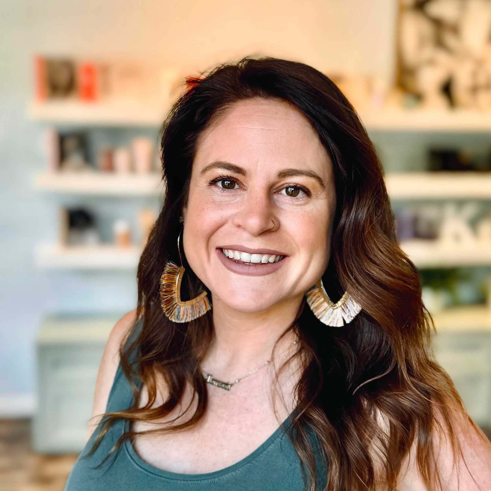 Portrait of Camerin, a professional stylist at Elixir x DV8 the salon, showcasing their expertise and style.