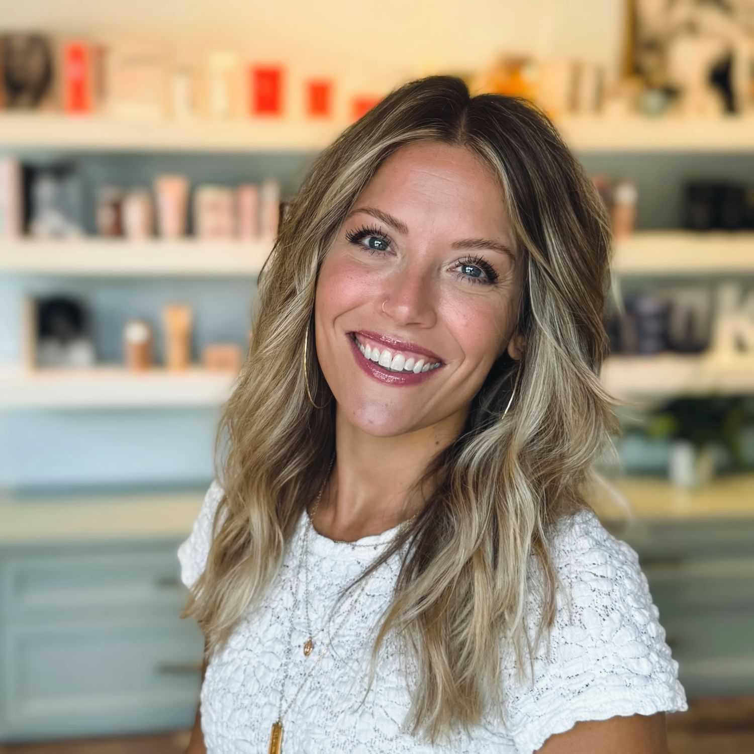 Portrait of Nicole, a professional stylist at Elixir x DV8 the salon, showcasing their expertise and style.