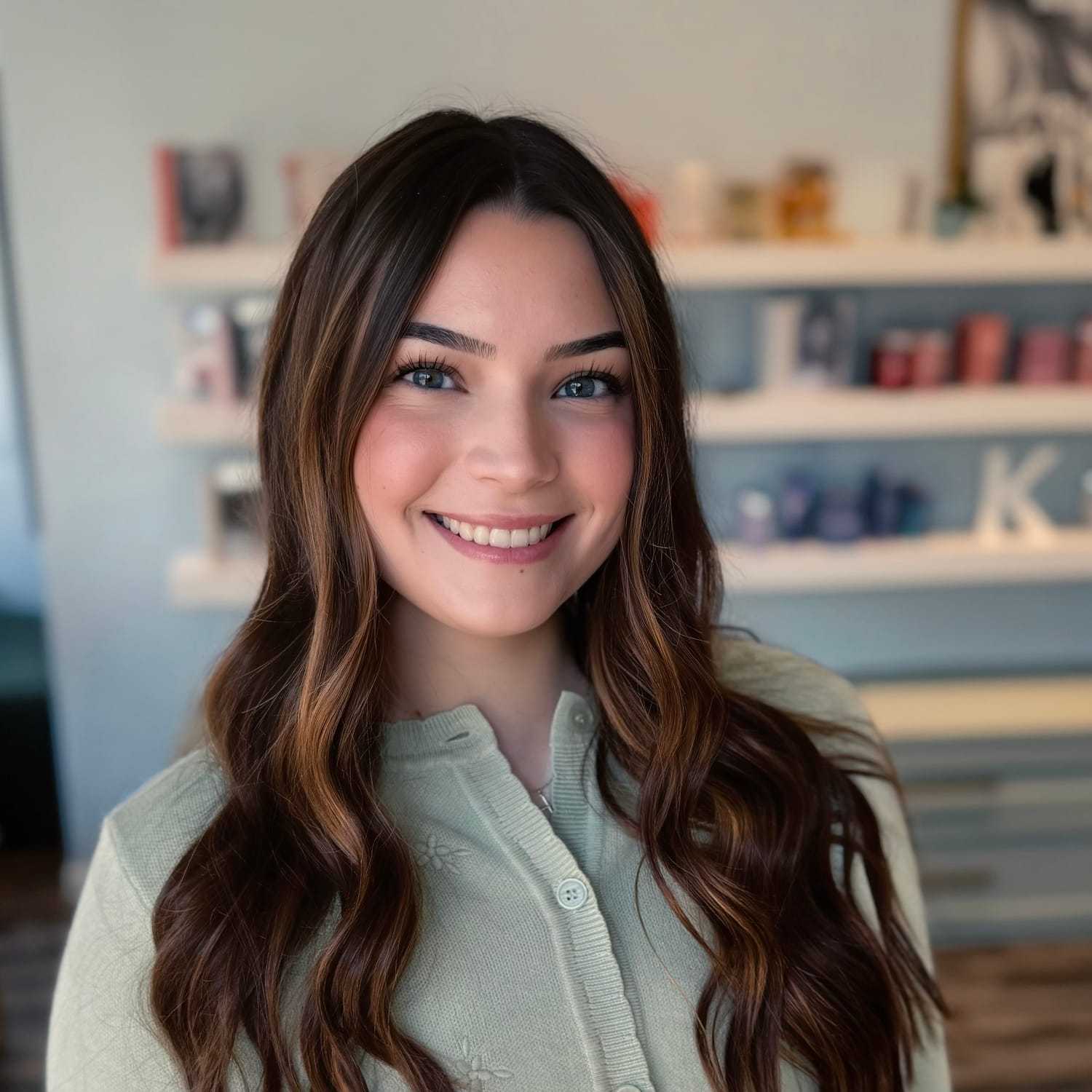 Portrait of Grace, a professional stylist at Elixir x DV8 the salon, showcasing their expertise and style.